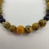 Elegante Bracciale in Pietra Onice Nera e Agata Maculata - immagine 2