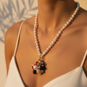 collana-perle-fiume-ciondolo-corallo-onice-zirconi-magie-creative