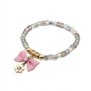 Bracciale Elastico in Cristalli Sfaccettati con Fiocco Rosa e Fiore